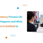 Manager handing a redundancy letter to an employee during a UK redundancy process meeting